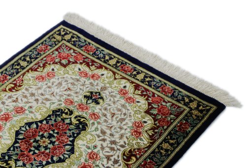Surface texture of New Ghom rug with natural Silk and intricate pattern