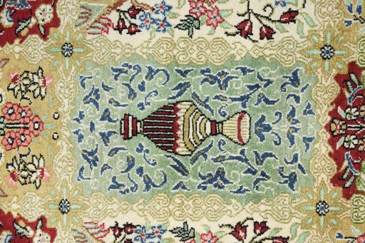 Close-up detail of New Ghom rug from Iran / Persia showing Silk weave