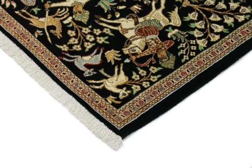Backside of handmade New Ghom rug showing knot structure and weave density