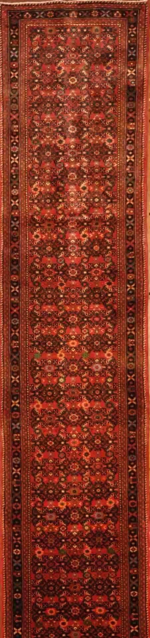 Full view of New Hoseinabad rug from Iran / Persia, 1100 × 75 cm in Red tones