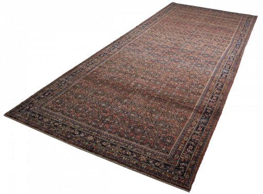 Close-up detail of 2000s Hoseinabad rug from Iran / Persia showing Wool weave