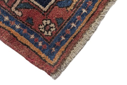 Central medallion detail of 2000s Hoseinabad rug from Iran / Persia
