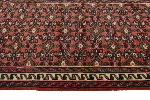 Close-up detail of 2000s Hoseinabad rug from Iran / Persia showing Wool weave