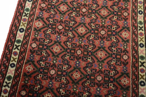 Backside of handmade 2000s Hoseinabad rug showing knot structure and weave density