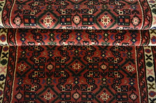 Full view of 2000s Hoseinabad rug from Iran / Persia, 286 × 73 cm in Red tones