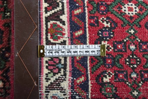 Close-up detail of New Hoseinabad rug from Iran / Persia showing Wool weave