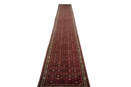 Surface texture of New Hoseinabad rug with natural Wool and intricate pattern