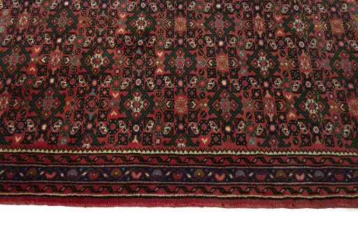 Close-up detail of New Hoseinabad rug from Iran / Persia showing Wool weave