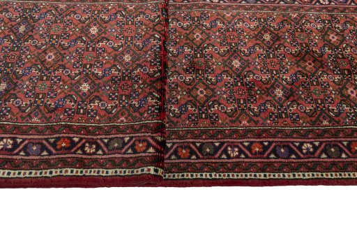 Close-up detail of New Hoseinabad rug from Iran / Persia showing Wool weave