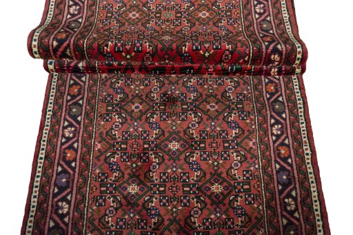 Full view of New Hoseinabad rug from Iran / Persia, 792 × 82 cm in Red tones