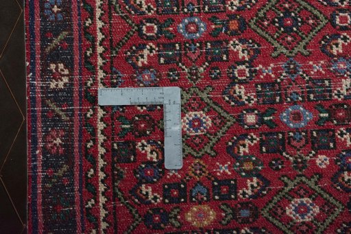 Close-up detail of New Hoseinabad rug from Iran / Persia showing Wool weave