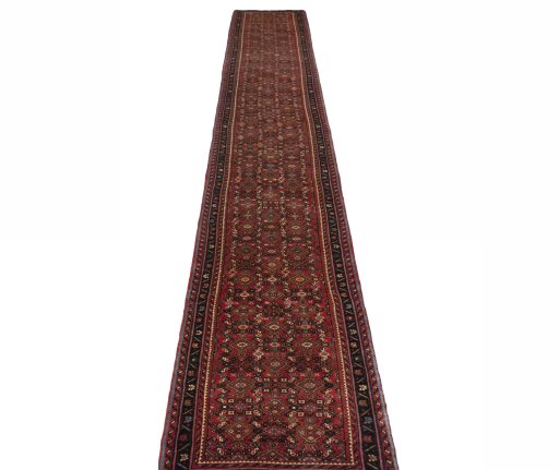 Surface texture of New Hoseinabad rug with natural Wool and intricate pattern