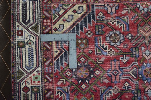 Close-up detail of 2000s Hoseinabad rug from Iran / Persia showing Wool weave