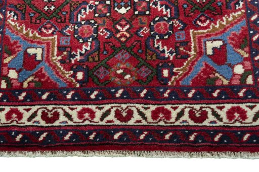 Central medallion detail of New Hoseinabad rug from Iran / Persia
