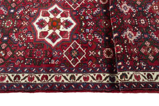 Close-up detail of New Hoseinabad rug from Iran / Persia showing Wool weave