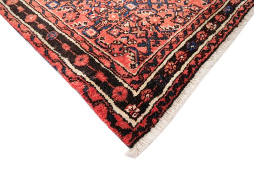 Backside of handmade 1990s Hoseinabad rug showing knot structure and weave density