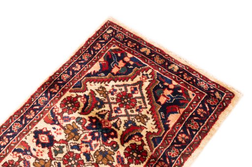 Close-up detail of 1998s Hoseinabad rug from Iran / Persia showing Wool weave