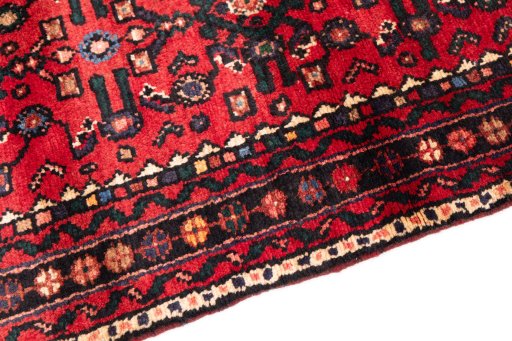 Backside of handmade 2000s Hoseinabad rug showing knot structure and weave density
