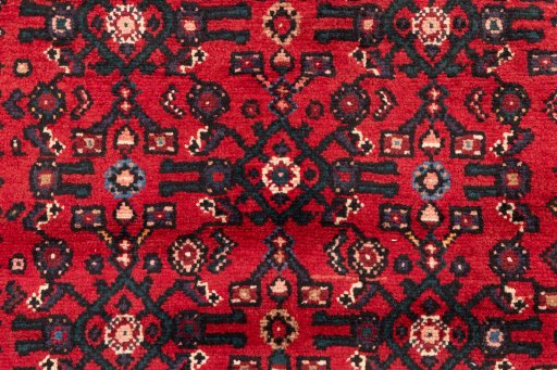 Full view of 2000s Hoseinabad rug from Iran / Persia, 412 × 82 cm in Red tones