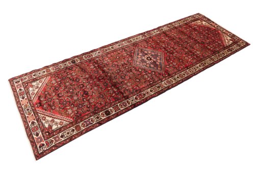 Close-up detail of 1975s Hoseinabad rug from Iran / Persia showing Wool weave
