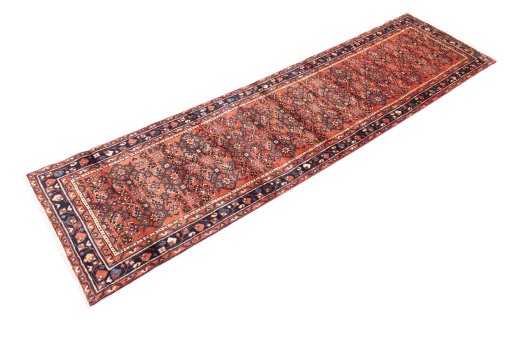 Close-up detail of 1975s Hoseinabad rug from Iran / Persia showing Wool weave
