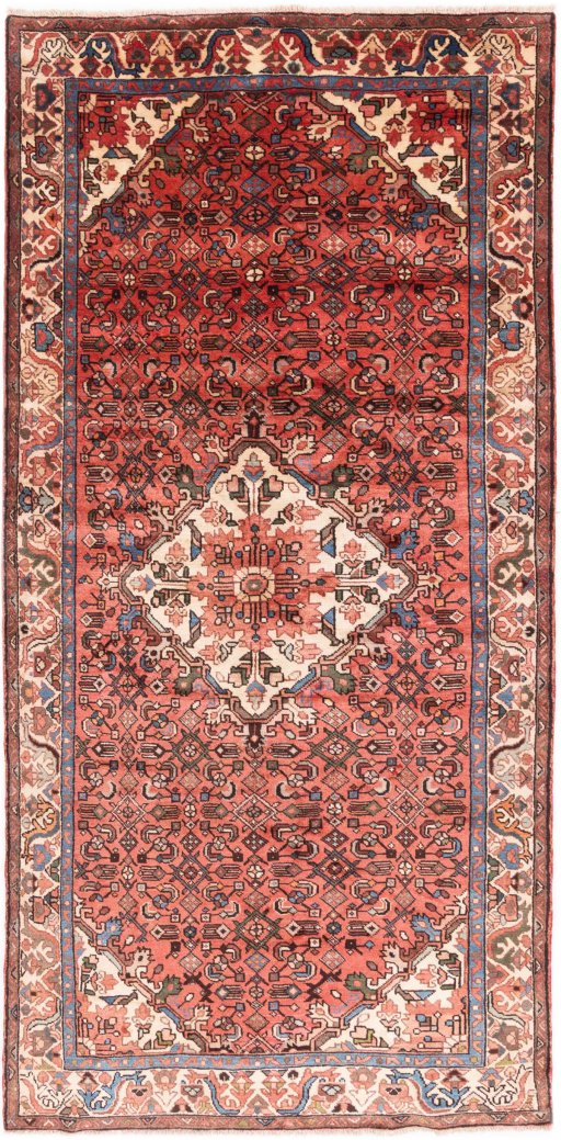 Full view of 1997s Hoseinabad rug from Iran / Persia, 323 × 156 cm in Terracotta tones