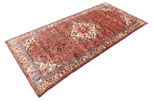 Close-up detail of 1997s Hoseinabad rug from Iran / Persia showing Wool weave