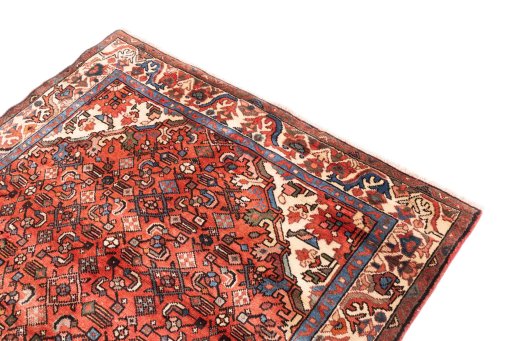 Surface texture of 1997s Hoseinabad rug with natural Wool and intricate pattern