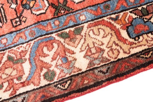 Backside of handmade 1997s Hoseinabad rug showing knot structure and weave density