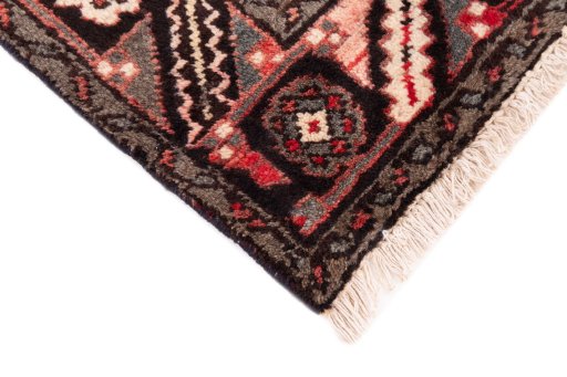 Central medallion detail of 1970s Hoseinabad rug from Iran / Persia