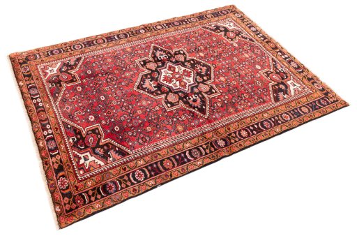 Corner detail of 1980s Hoseinabad rug showing border pattern and Wool pile