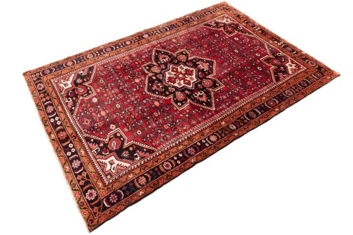 Close-up detail of 1980s Hoseinabad rug from Iran / Persia showing Wool weave