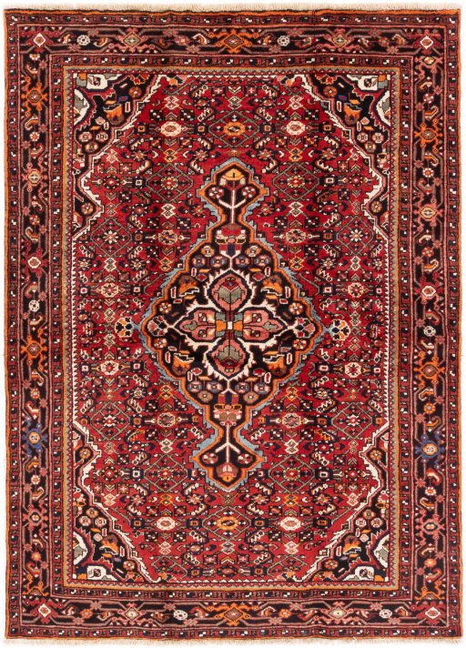 Full view of 1988s Hoseinabad rug from Iran / Persia, 216 × 160 cm in Red tones