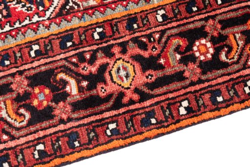 Backside of handmade 1988s Hoseinabad rug showing knot structure and weave density