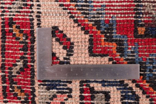 Close-up detail of 1988s Hoseinabad rug from Iran / Persia showing Wool weave
