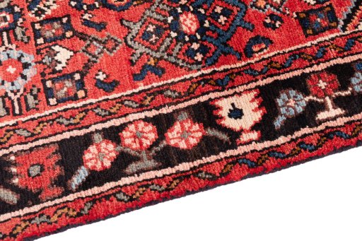 Backside of handmade 1988s Hoseinabad rug showing knot structure and weave density