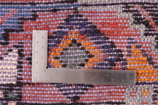 Close-up detail of 1974s Hoseinabad rug from Iran / Persia showing Wool weave