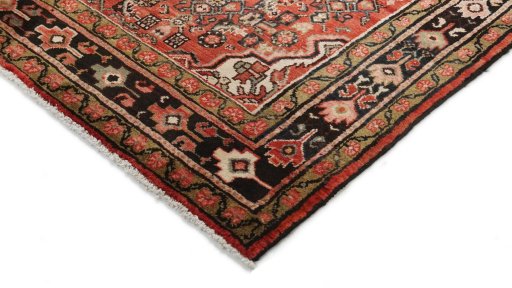 Backside of handmade 1990s Hoseinabad rug showing knot structure and weave density