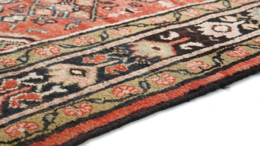 Central medallion detail of 1990s Hoseinabad rug from Iran / Persia