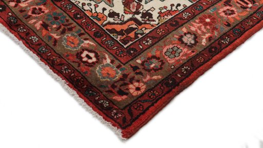 Backside of handmade 2000s Hoseinabad rug showing knot structure and weave density