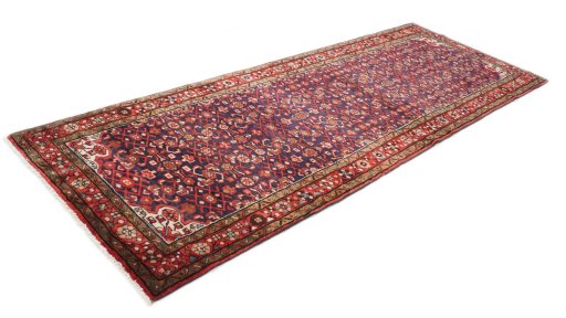 Close-up detail of 2000s Hoseinabad rug from Iran / Persia showing Wool weave