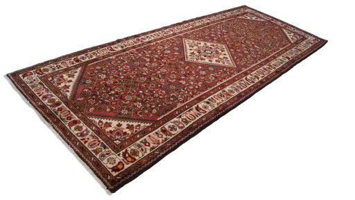 Close-up detail of 2000s Hoseinabad rug from Iran / Persia showing Wool weave