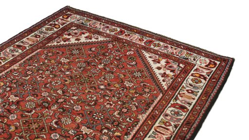 Surface texture of 2000s Hoseinabad rug with natural Wool and intricate pattern