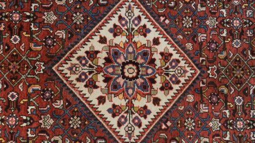 Central medallion detail of 2000s Hoseinabad rug from Iran / Persia