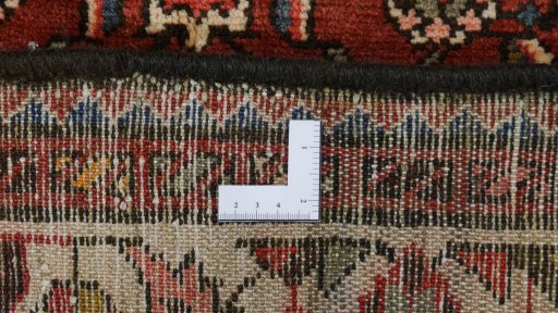 Full view of 2000s Hoseinabad rug from Iran / Persia, 335 × 137 cm in Multi Color tones