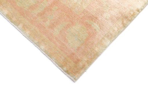 Backside of handmade New Isfahan rug showing knot structure and weave density