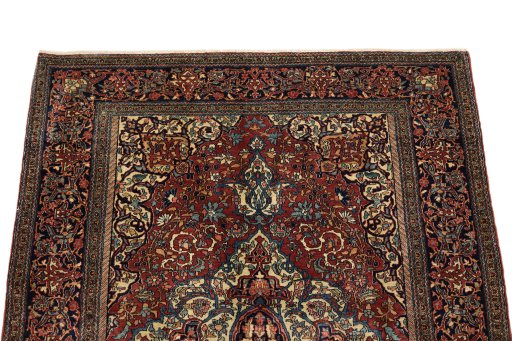 Surface texture of 1900s Isfahan rug with natural Wool and intricate pattern