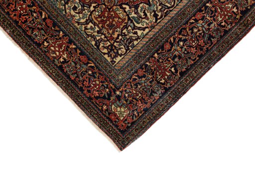 Backside of handmade 1900s Isfahan rug showing knot structure and weave density