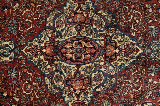 Central medallion detail of 1900s Isfahan rug from Iran / Persia