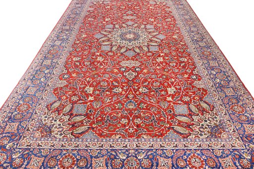 Surface texture of 1930s Isfahan rug with natural Wool and intricate pattern